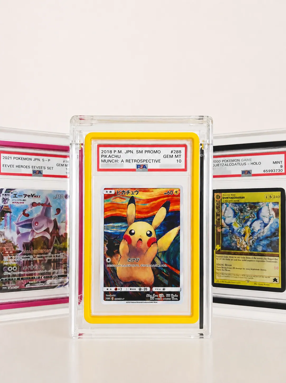 PowerGuard Vault in yellow displaying a graded Pikachu card